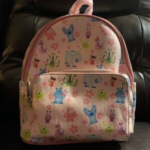 Danielle Nicole Monsters Inc Disney Travelbag or Backpack